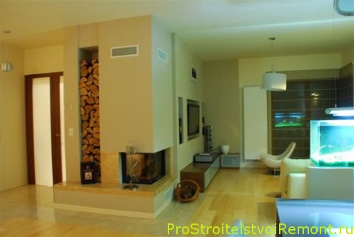 Дизайн гостиной с камином, аквариумом и плазменным телевизором фото