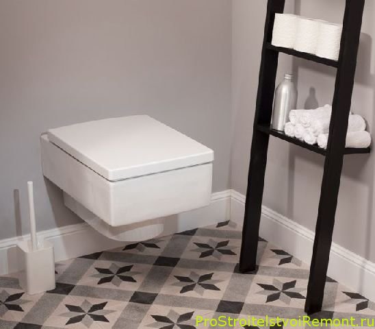 Подвесной унитаз в стильной ванной комнате фото